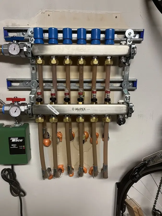 Plumber performing Water Heater Repair at a residential property in Brices Creek